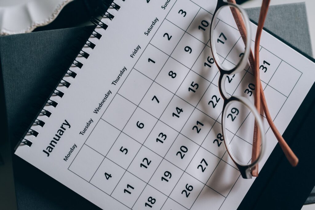 calendar with glasses on top